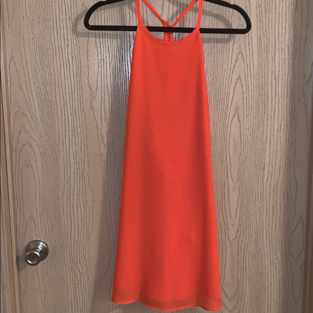 bright orange dress with cute braid detail on back